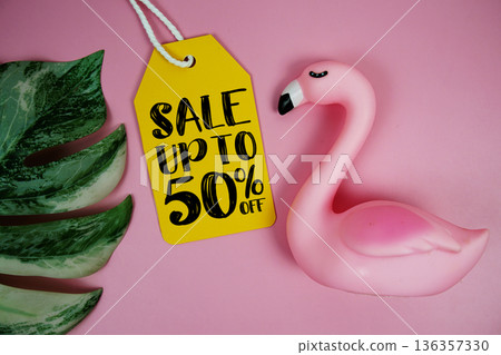 Price tag Sale 50% with summer decorations on pink background Price tag Sale 50% with summer decorations on pink background 136357330