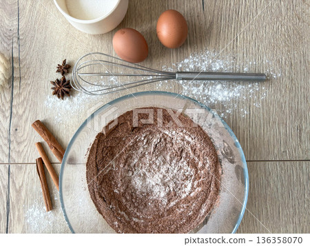 Ingredients for homemade baking on a wooden table 136358070