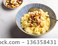 Millet porridge with mixed nuts 136358431