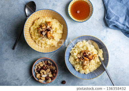 Millet porridge with mixed nuts 136358432