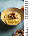 Millet porridge with mixed nuts 136358433