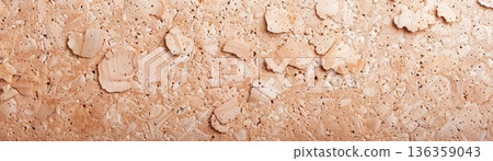 Close-up texture of brown cork board surface. Close-up texture of brown cork board surface. 136359043