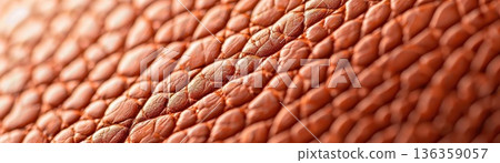 Close-up texture of brown leather with diamond pattern. Close-up texture of brown leather with diamond pattern. 136359057