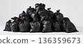 pile of black trash bags piled high up 136359673