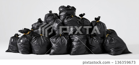 pile of black trash bags piled high up pile of black trash bags piled high up 136359673