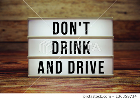 Lightbox with text "Don't Drink And Drive" on wooden background Lightbox with text "Don't Drink And Drive" on wooden background 136359734