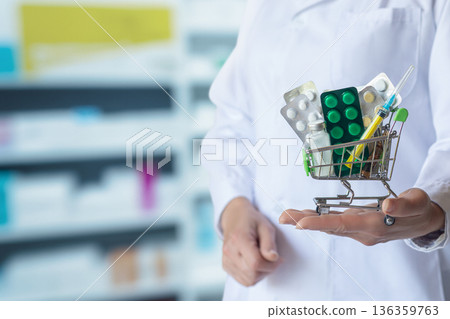 Mini cart filled with medicine. Mini cart filled with medicine. 136359763