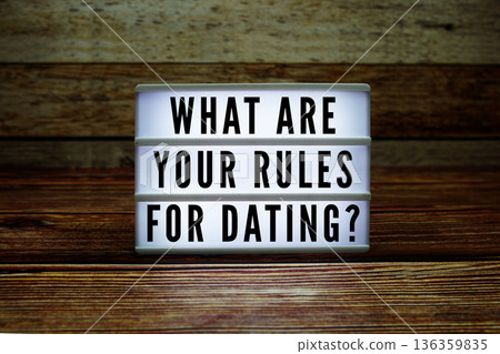 Lightbox with text "What Are Your Rules For Dating?" on wooden background Lightbox with text "What Are Your Rules For Dating?" on wooden background 136359835