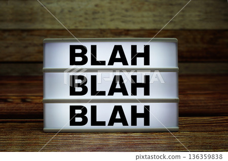 Lightbox with text "Blah Blah Blah" on wooden background Lightbox with text "Blah Blah Blah" on wooden background 136359838