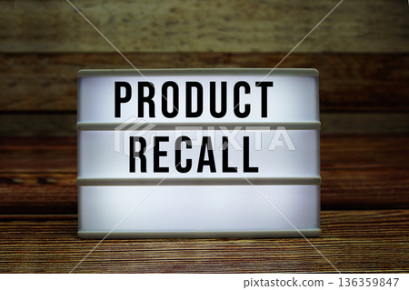 Lightbox with text "Product Recall" on wooden background 136359847
