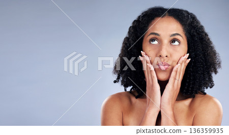 Woman touch face, pout and beauty with natural skincare, cosmetics and curly hair on studio background. Mockup space, wellness and kiss with hands, manicure and female model, skin glow and self love Woman touch face, pout and beauty with natural skincare, cosmetics and curly hair on studio background. Mockup space, wellness and kiss with hands, manicure and female model, skin glow and self love 136359935