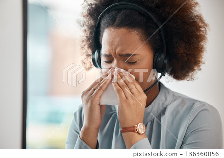 Consultant, sick woman and blowing nose in office for flu, allergies, and health risk in telemarketing agency. Face of female sales agent, call centre and tissue for virus, allergy and sneeze Consultant, sick woman and blowing nose in office for flu, allergies, and health risk in telemarketing agency. Face of female sales agent, call centre and tissue for virus, allergy and sneeze 136360056