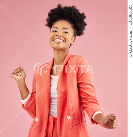 Smile, dancing and portrait of a woman in a studio with music, playlist or album for celebration. Happiness, excited and young African female model moving to a song isolated by a pink background. 136360106