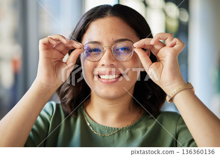 Woman, glasses and portrait with smile, optometry and health with eyes, choice and fashion in store. Girl, frame and lens for wellness, vision and shop for eyesight, decision and customer experience Woman, glasses and portrait with smile, optometry and health with eyes, choice and fashion in store. Girl, frame and lens for wellness, vision and shop for eyesight, decision and customer experience 136360136