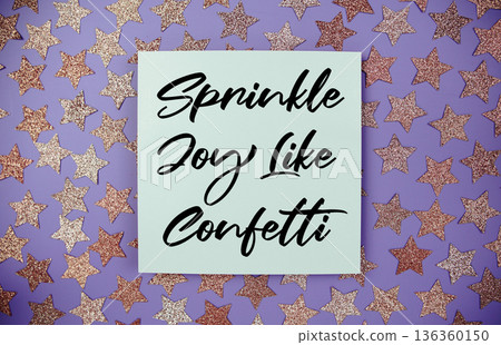 Sprinkle Joy Like Confetti text on paper card with star glitter decoration flat lay on purple background Sprinkle Joy Like Confetti text on paper card with star glitter decoration flat lay on purple background 136360150