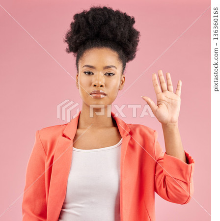 African woman, hand and stop in portrait, studio or opinion for protest, vote or icon by pink background. Girl, open palm and sign language with voice, emoji and afro with review, feedback or warning 136360168