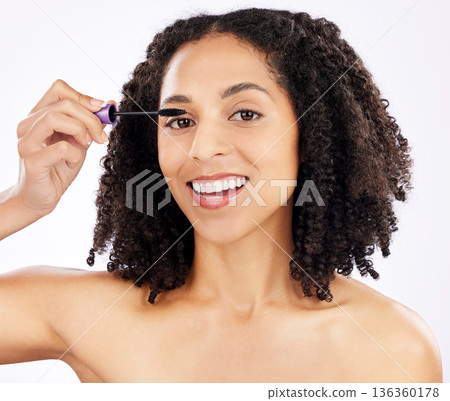 Beauty, mascara and portrait of black woman on a white background for wellness, makeup and cosmetics. Dermatology, cosmetology and face of happy female person with product for eyelashes in studio 136360178
