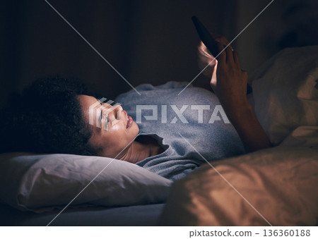 App, night and phone with woman in bedroom for social media, insomnia and networking. Communication, contact and internet with female person relax in bed at home for mobile, online and technology 136360188