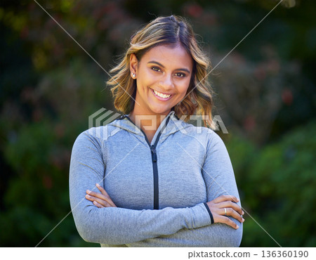 Runner woman, arms crossed and portrait in park, smile and exercise with fitness training in nature. Indian girl, happy and pride for wellness, health or outdoor workout for body, self care or goals Runner woman, arms crossed and portrait in park, smile and exercise with fitness training in nature. Indian girl, happy and pride for wellness, health or outdoor workout for body, self care or goals 136360190