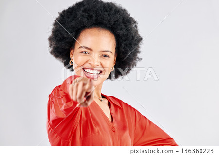 Portrait, smile and pointing with an afro black woman in studio on a white background to vote for you. Face, opportunity and voice with a happy young female making a choice, selection or decision 136360223
