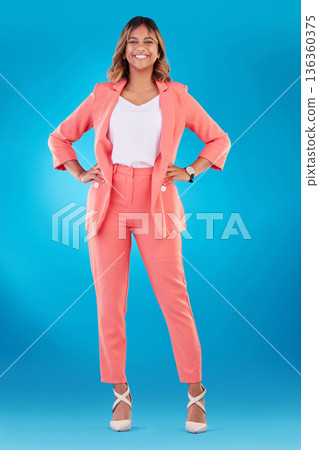 Fashion, happy and portrait of business woman in studio confident for career, job and startup. Corporate, professional and female person with trendy clothes, pride and formal style on blue background 136360375