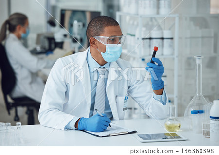Science, laboratory and man with blood work for doctor research and study in clinic. Lab, analysis and healthcare professional with innovation and dna investigation for hospital test of scientist Science, laboratory and man with blood work for doctor research and study in clinic. Lab, analysis and healthcare professional with innovation and dna investigation for hospital test of scientist 136360398