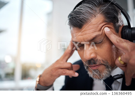 Stress, call center and face of man in customer service agency with pain, burnout or anxiety. Headache, frustrated and tired salesman consulting with challenge, client problem and fatigue for mistake 136360495
