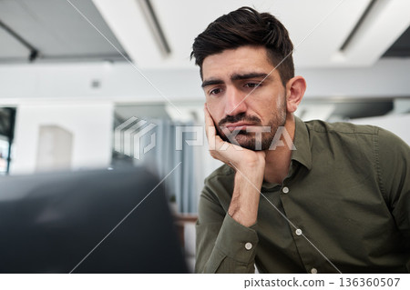 Sad, businessman and working in an office on laptop, desk and workplace with fatigue, tired energy and burnout. Depressed, consultant and work on computer with anxiety for feedback or project email 136360507