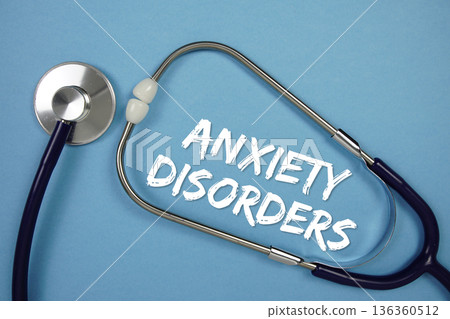 Anxiety Disorders text with stethoscope on blue background Anxiety Disorders text with stethoscope on blue background 136360512