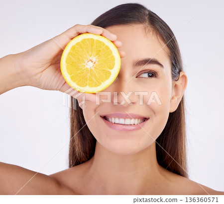 Beauty, studio face and happy woman with lemon for skincare glow, vitamin c detox and natural facial exfoliation. Fruit, organic cosmetics and person with citrus product benefits on white background Beauty, studio face and happy woman with lemon for skincare glow, vitamin c detox and natural facial exfoliation. Fruit, organic cosmetics and person with citrus product benefits on white background 136360571
