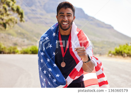USA, winner and portrait of happy man with American flag for fitness goal, success or running competition. Proud champion runner, winner or excited athlete with race victory or gold medal on road 136360579