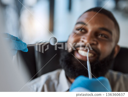 Man, hands and dentist tools for cleaning in clinic for medical treatment, teeth whitening or veneer hygiene. Smile, mirror and dental excavator for African patient in mouth health checkup or consult 136360637