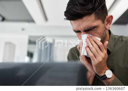 Business man, blowing nose and tissue in office with flu, mucus or allergies for healthcare problem. Sick entrepreneur, toilet paper and cleaning for wellness, workplace and virus with cold bacteria 136360687