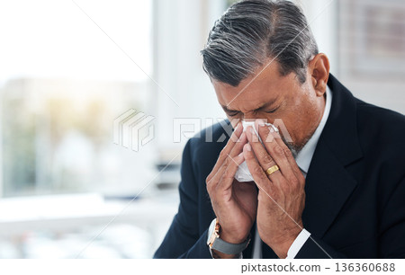 Sick business man, tissue and blowing nose for allergies, cold and virus in law firm. Face of mature lawyer sneeze with influenza, allergy bacteria and risk of health problem, sinusitis and infection Sick business man, tissue and blowing nose for allergies, cold and virus in law firm. Face of mature lawyer sneeze with influenza, allergy bacteria and risk of health problem, sinusitis and infection 136360688