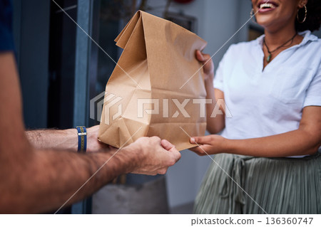 Delivery, customer and hands with a paper bag at door from courier man at home. Giving woman or a client a package, parcel or fast food from online shopping, e-commerce or distribution service Delivery, customer and hands with a paper bag at door from courier man at home. Giving woman or a client a package, parcel or fast food from online shopping, e-commerce or distribution service 136360747