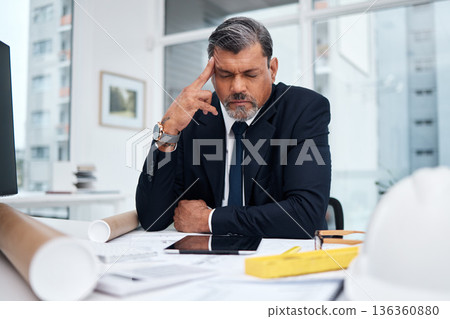 Frustrated, tired and architect man in an office with a design problem, mistake or deadline for project. Mature male engineer stress about headache, fatigue or crisis in construction industry Frustrated, tired and architect man in an office with a design problem, mistake or deadline for project. Mature male engineer stress about headache, fatigue or crisis in construction industry 136360880