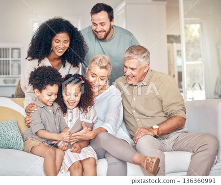 Big family, tablet and children in home, happy and bonding together in living room. Technology, multiracial kids and grandparents with parents in lounge streaming movie, video or film on social media Big family, tablet and children in home, happy and bonding together in living room. Technology, multiracial kids and grandparents with parents in lounge streaming movie, video or film on social media 136360991