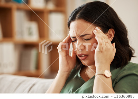 Stress, headache and woman on a sofa with vertigo, brain fog or burnout in her home. Migraine, anxiety and female in a living room with problem fail or crisis, fatigue or mental health problem Stress, headache and woman on a sofa with vertigo, brain fog or burnout in her home. Migraine, anxiety and female in a living room with problem fail or crisis, fatigue or mental health problem 136360993