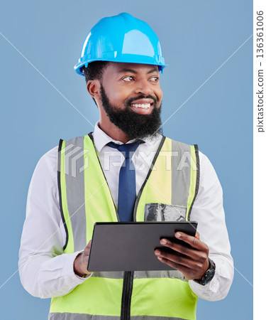 Happy black man, architect and tablet for construction inspection against a blue studio background. African male person, engineer or contractor working on technology for architecture or project plan 136361006