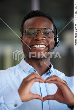 Customer support, portrait or happy black man with heart hands sign for call center care, help desk consultation or service. Networking person, face or African consultant with kindness, love or smile Customer support, portrait or happy black man with heart hands sign for call center care, help desk consultation or service. Networking person, face or African consultant with kindness, love or smile 136361023