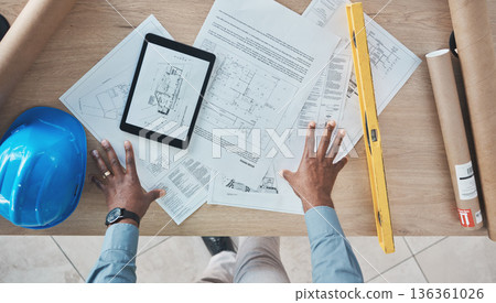 Architecture, person hands and blueprint planning, construction design and renovation on desk above. Engineering paper, floor plan and project management sketch or drawing tools on digital technology Architecture, person hands and blueprint planning, construction design and renovation on desk above. Engineering paper, floor plan and project management sketch or drawing tools on digital technology 136361026