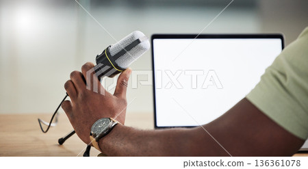 Podcast, tablet and mockup with hand of person for live streaming, radio and speaker. Social media, influencer and communication with closeup of man for microphone, digital and production banner 136361078