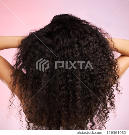 Hair, beauty and back of person with hairstyle transformation and curly texture. Model, salon treatment and haircut shine in a studio with pink background and cosmetics with keratin and growth care 136361083