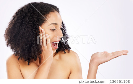 Beauty, mockup space and black woman with surprise advertising for wellness, health and skincare product. Dermatology, salon and female person with hand sign for cosmetics, makeup and deal in studio Beauty, mockup space and black woman with surprise advertising for wellness, health and skincare product. Dermatology, salon and female person with hand sign for cosmetics, makeup and deal in studio 136361108