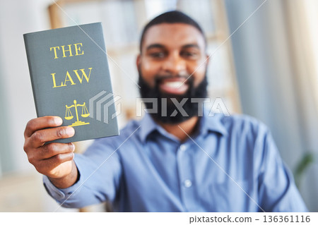 Law, book and happy portrait of a man with the rules or research on legal constitution, regulation or policy from government. African businessman, lawyer or attorney with knowledge of justice Law, book and happy portrait of a man with the rules or research on legal constitution, regulation or policy from government. African businessman, lawyer or attorney with knowledge of justice 136361116