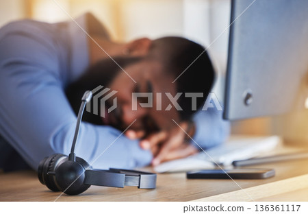 Call center, tired and man sleeping with microphone at desk for burnout, fatigue and low energy in telemarketing office. Closeup, stress and business consultant taking a nap at table in sales agency Call center, tired and man sleeping with microphone at desk for burnout, fatigue and low energy in telemarketing office. Closeup, stress and business consultant taking a nap at table in sales agency 136361117