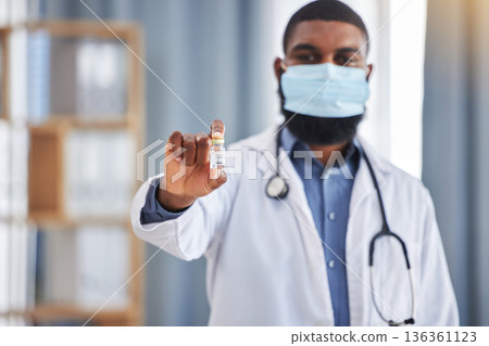 Healthcare, liquid and doctor portrait with vaccine, medicine or medical drugs in hospital. Clinic, African male professional and container for injection, virus prevention and medication for disease Healthcare, liquid and doctor portrait with vaccine, medicine or medical drugs in hospital. Clinic, African male professional and container for injection, virus prevention and medication for disease 136361123