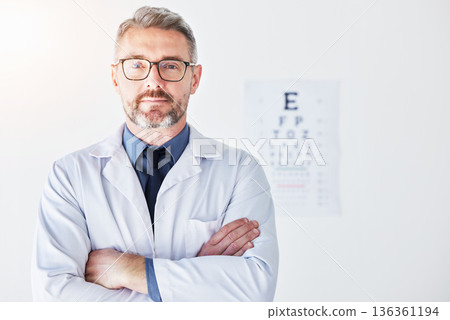 Senior man, arms crossed with optometrist in portrait, vision and glasses, eye care clinic and healthcare. Male person, ophthalmology and health for eyes, eyesight assessment and prescription lens Senior man, arms crossed with optometrist in portrait, vision and glasses, eye care clinic and healthcare. Male person, ophthalmology and health for eyes, eyesight assessment and prescription lens 136361194