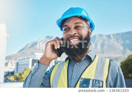 Happy, man and phone call for construction in city with civil engineering, building industry and renovation. Face of african male architect talking on smartphone for discussion of project management 136361203