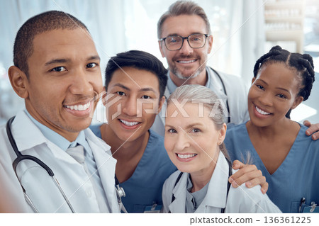 Doctors, diversity and selfie with healthcare, happy and memory with teamwork, social media and career. Portrait, staff or profile picture with happiness, medical professionals or fun in a hospital Doctors, diversity and selfie with healthcare, happy and memory with teamwork, social media and career. Portrait, staff or profile picture with happiness, medical professionals or fun in a hospital 136361225